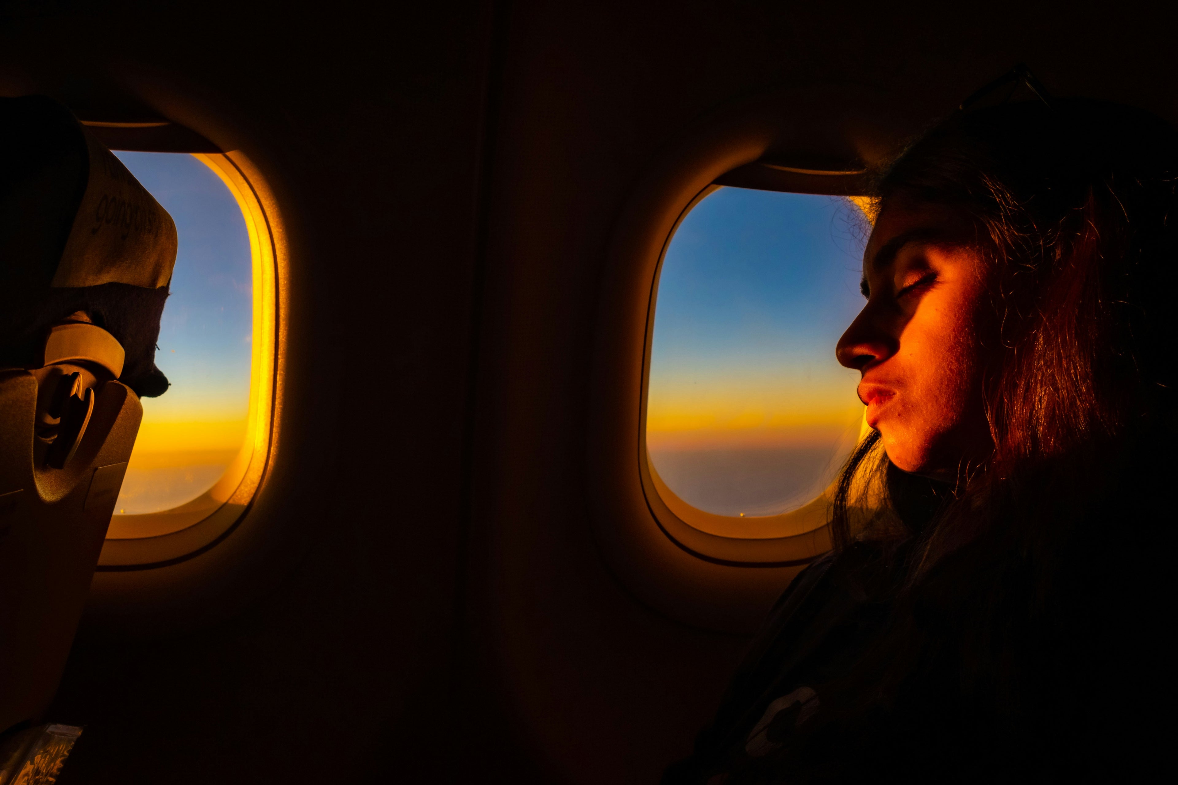 Woman sleeping on airplane